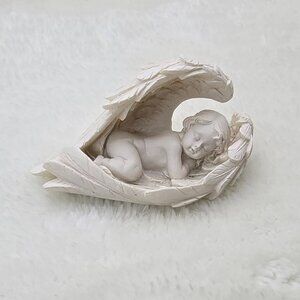 Sleeping Cherubim (Baby Angel) in Wings Figurine